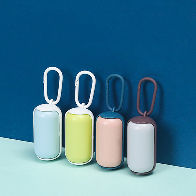 Portable Pet Litter Box and Dog Toilet Picker in a compact size with a carabiner for easy carrying.